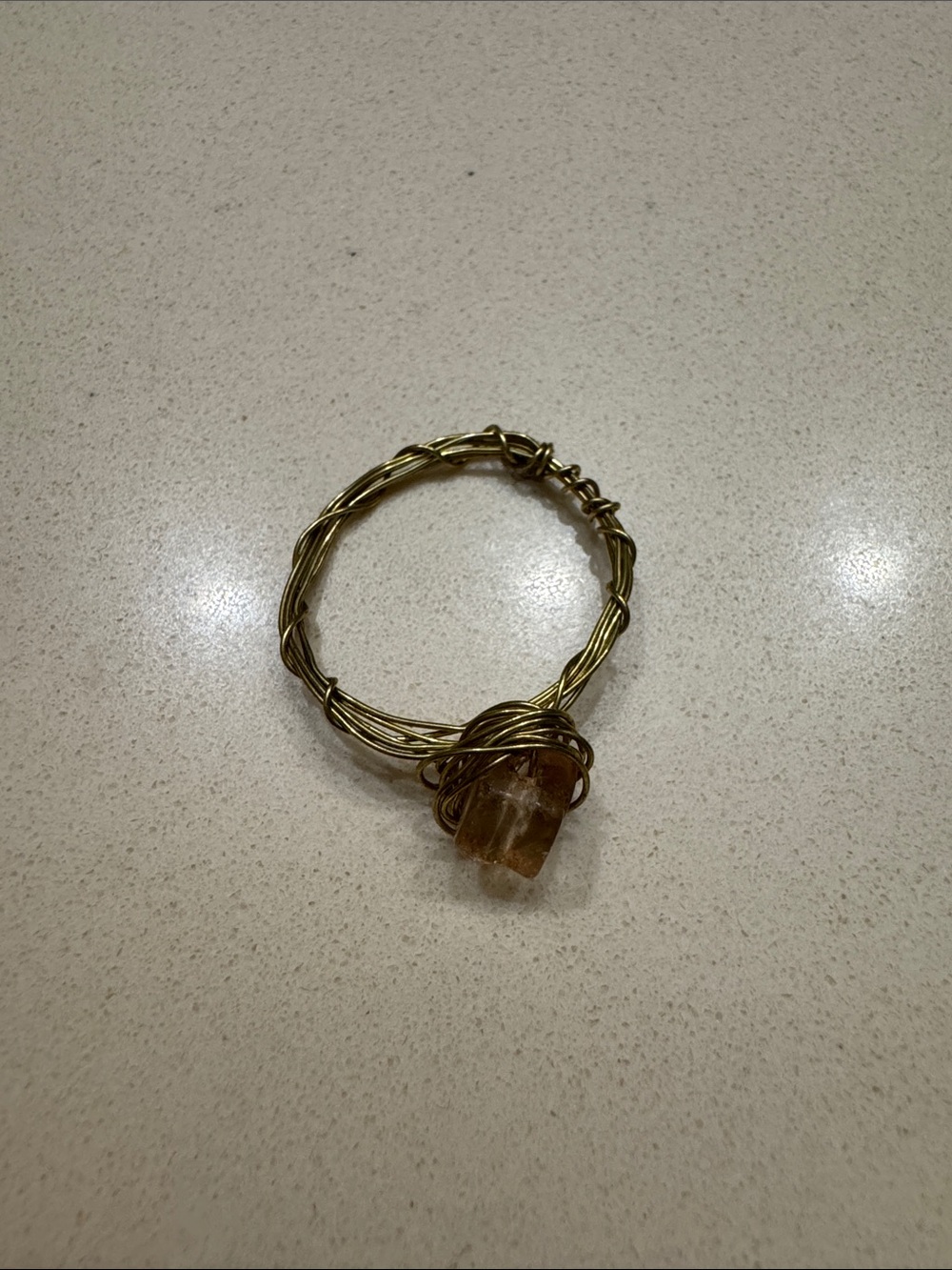 Handcrafted Gold-Tone Wire Bracelet with Amber Gemstone